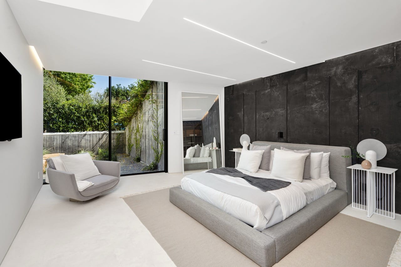 Modern bedroom interior with natural light and texture